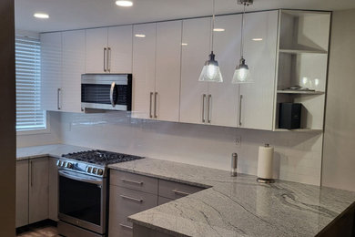 Example of a mid-sized minimalist kitchen design in Philadelphia