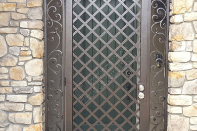 All Custom Iron Entryway with custom iron scrolls, iron lattice