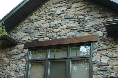 Inspiration for a timeless gray stone exterior home remodel in Toronto
