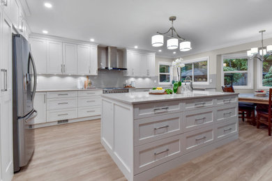 Example of a transitional kitchen design in Vancouver