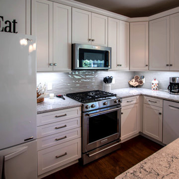 White Shaker Kitchen w/ Pietra Quartz Countertop and Gray Subway Tile Backsplash
