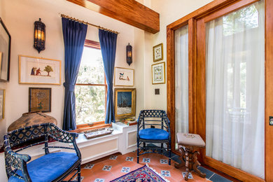 Inspiration for a mid-sized timeless terra-cotta tile sunroom remodel in Denver with a skylight