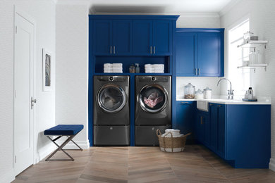 Laundry room - southwestern laundry room idea in New York with white countertops