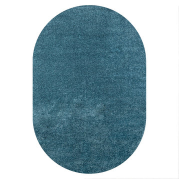 Haze Solid Low-Pile Turquoise 5 ft. x 8 ft. Oval Area Rug