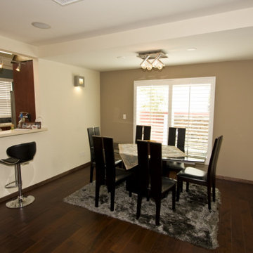 Dining Nook With Bar Seating and Bay Window