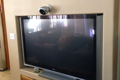 Wall Mounted TV Above Fireplace with Surround Sound, Cables Concealed