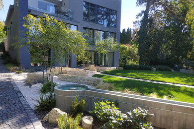 Inspiration for a mid-sized eclectic landscaping in Other.