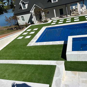 Luxury Outdoor Space with Cool Blue Hollow Lime Artificial Lawn and Pool Deck