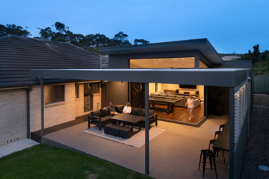 This is an example of a contemporary exterior in Newcastle - Maitland.