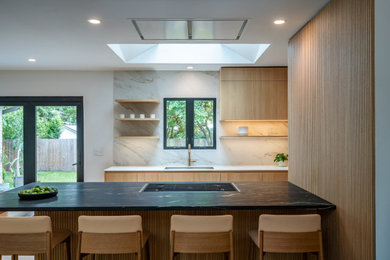 Example of a mid-sized trendy home design design in Cincinnati