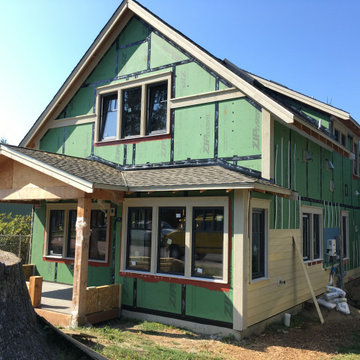 Zip system with SIPS roof, triple pane windows, rainscreen siding, solar panels