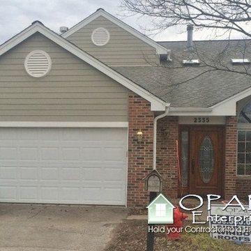 Front View of Hardie Monterey Taupe Plank Lap Siding with Brick in Lisle