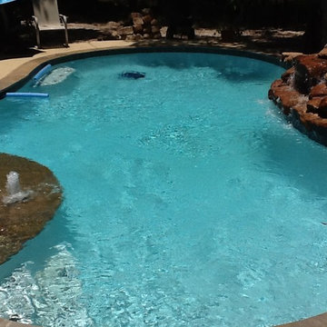 Hot spring in the woods by Cali Pools of Texas