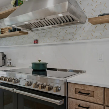 Warm Cherry Kitchen and Powder Room Remodel with Waterfall Island in Herndon, VA