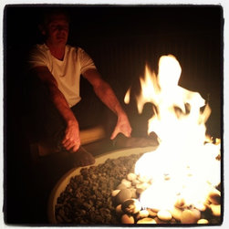Hemi Fire Pit in use at a client's property - Fire Pits