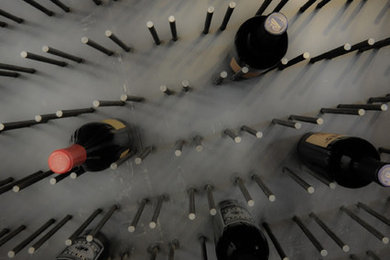 Inspiration for a large contemporary wine cellar remodel in Denver
