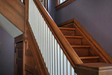 Elegant staircase photo in Grand Rapids
