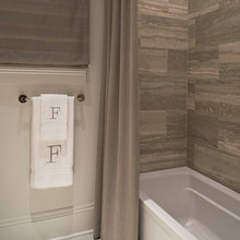 Guest bedroom idea. Love the rustic look of the porcelain planks in sho