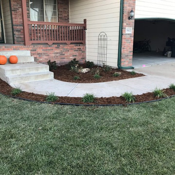Minimal budget friendly flowerbed install