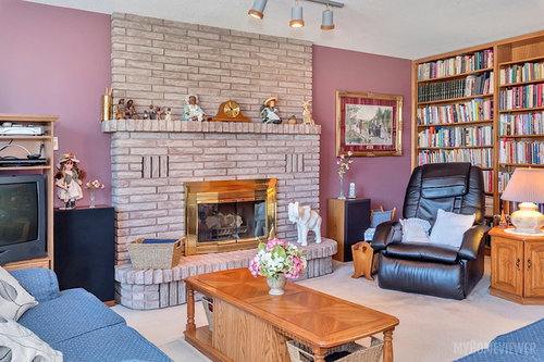 Leave the brick ledge on this fireplace if covering with ...