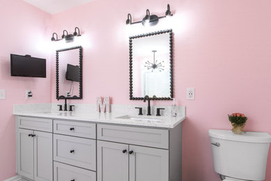 Freestanding bathtub - shabby-chic style multicolored tile double-sink freestanding bathtub idea in Other with gray cabinets, pink walls and an undermount sink