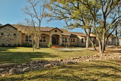 Example of a transitional exterior home design in Austin