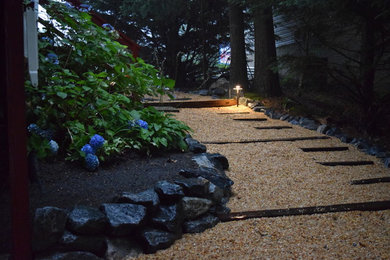 Photo of a mid-sized traditional garden path in Other.