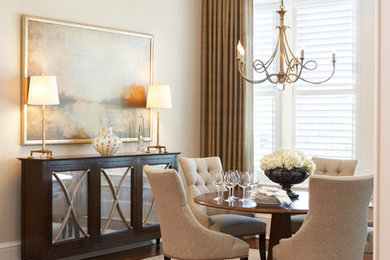 Example of a large transitional medium tone wood floor kitchen/dining room combo design in Atlanta with beige walls and no fireplace