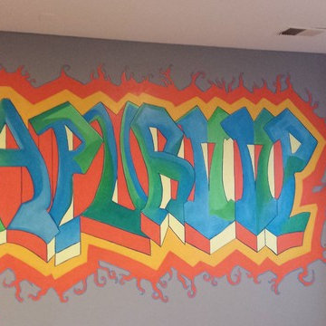 Graffiti name mural with glow in the dark paint