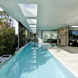 Crema Nova Honed Limestone flooring with 600x600 porcelain tile pool interior - Products