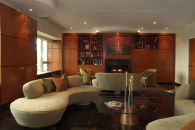 Living room - large contemporary formal and enclosed marble floor living room idea in Chicago with a standard fireplace, a wood fireplace surround and a media wall