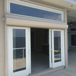 Motorized Rolling Hurricane Shutters- Mulheron Home - Products