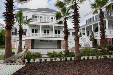 White three-story mixed siding exterior home idea in Charleston