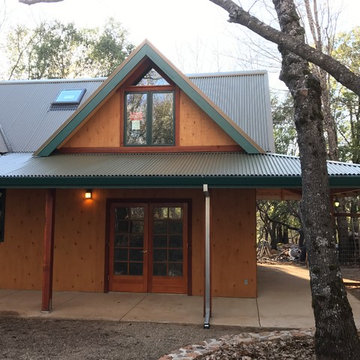 Workshop entry below, home office above
