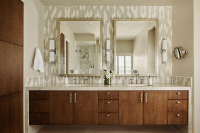 Bathroom - contemporary master multicolored tile and glass tile beige floor bathroom idea in Phoenix with flat-panel cabinets, medium tone wood cabinets, an undermount sink, a hinged shower door and gray countertops