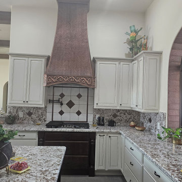 Custom Hammered Copper Range Hood in Arizona Luxury Kitchen