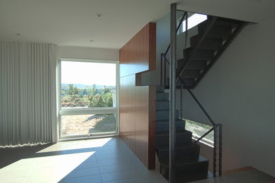 Minimalist u-shaped staircase photo in New York