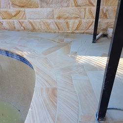 Crazy paving in pool area and rockface cladding sandstone - Products