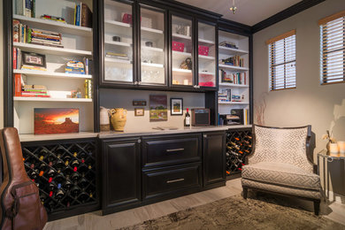 Example of a mid-sized transitional study room design in Phoenix with beige walls