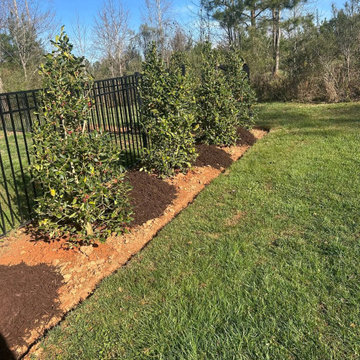Custom Turf Landscape Area with Stone Border