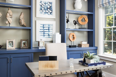 Inspiration for a transitional freestanding desk dark wood floor and brown floor study room remodel in Orlando with gray walls