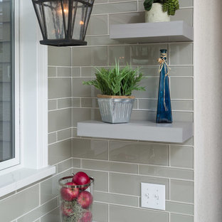 Design ideas for a small transitional l-shaped kitchen pantry in Other with an undermount sink, raised-panel cabinets, grey cabinets, quartz benchtops, grey splashback, glass tile splashback, coloured appliances, vinyl floors and a peninsula.