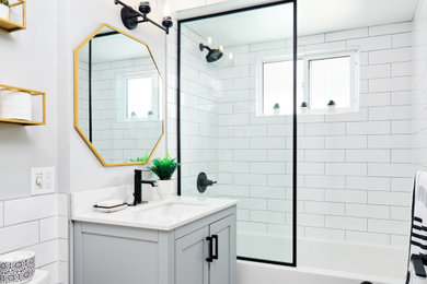 Inspiration for a small eclectic kids' white tile and porcelain tile porcelain tile, multicolored floor and single-sink bathroom remodel in Vancouver with shaker cabinets, gray cabinets, a two-piece toilet, gray walls, an undermount sink, quartz countertops, white countertops and a freestanding vanity