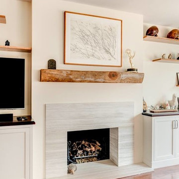 Wooden Mantel and Stone Fireplace Surround