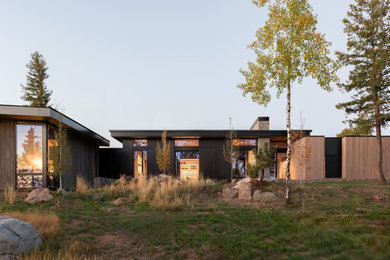 Example of a minimalist exterior home design in Denver