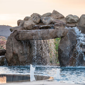 Natural Stone Freeform Pool + Perimeter Overflow Spa