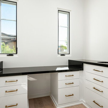 Utility Room with Black Countertops
