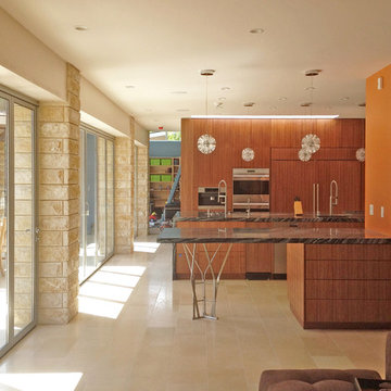 breakfast bar, kitchen and accordion doors