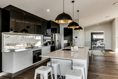 Photo of a contemporary kitchen in Central Coast with with island.