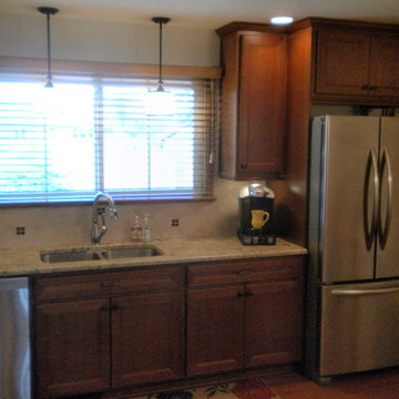 AFTER Cherry Cabinets with Typhoon Bordeaux Granite Counter Tops